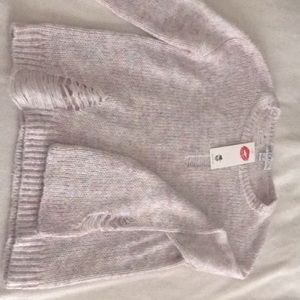 White Fox multi colored distressed sweater. Size small. NWT